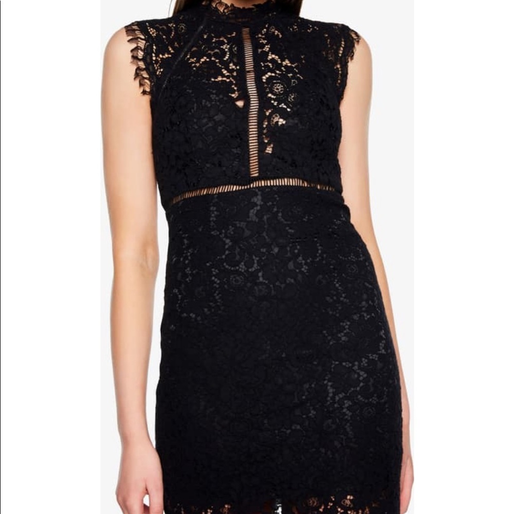 Lace body-con dress in burgundy.